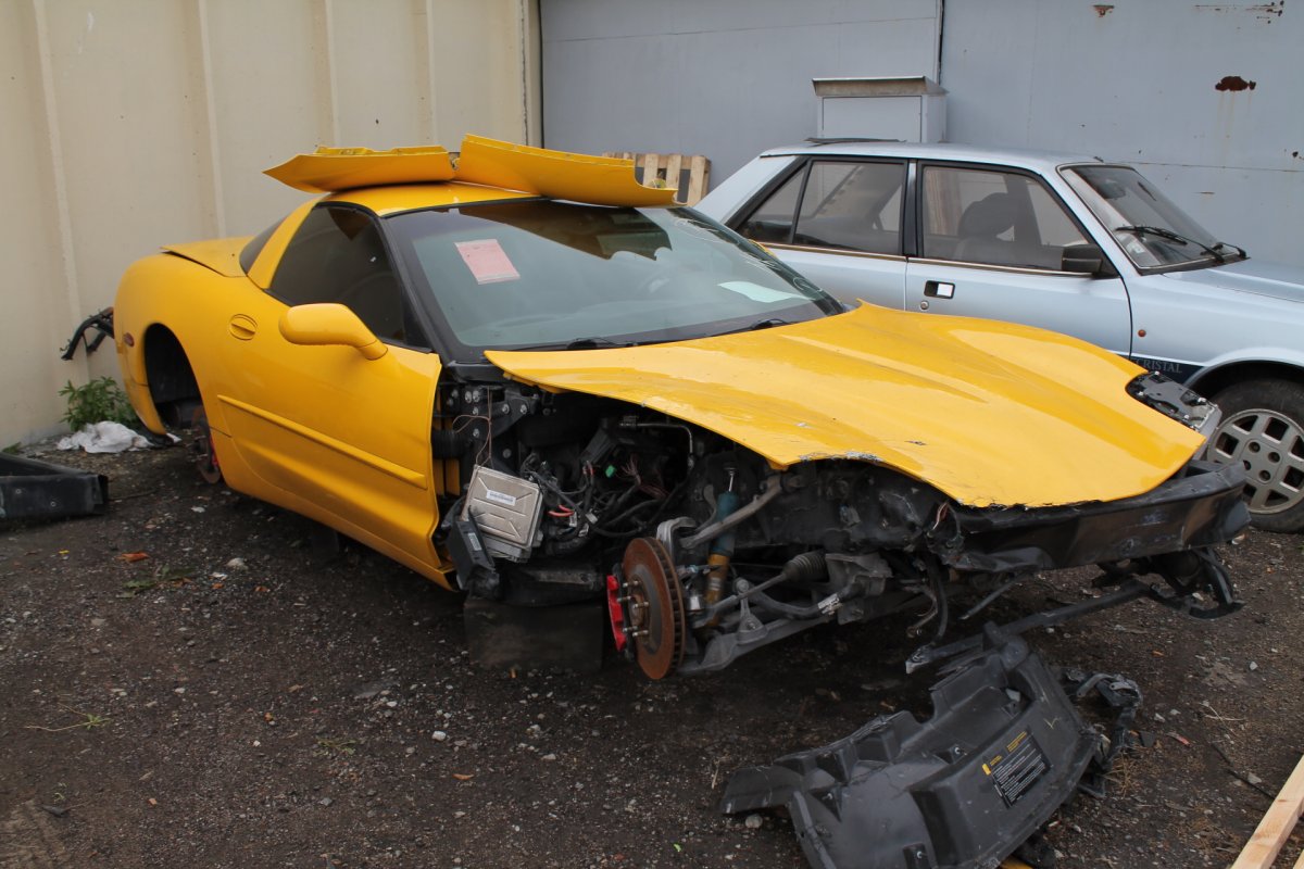 Yellow Corvette Becomes Black - Step 1 (Before Restoration)